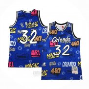 Camiseta Orlando Magic Shaquille O'Neal #32 Slap Sticker Mitchell & Ness 1994-95 Azul